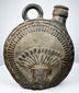 Ancient Peruvian pottery flask with radiating headdress and stepped geometric border