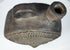Andean blackware vessel featuring sculptural human face decoration