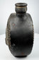 Pre-Columbian ceramic flask with stepped border surrounding a modeled face