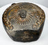 Ancient Peruvian blackware vessel with circular body and prominent loop handle