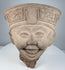 Classic Veracruz Sonriente terracotta head with expressive smile and elaborate geometric headdress