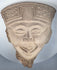Pre-Columbian Mexican terracotta head with elaborate flaring headdress and geometric relief decoration