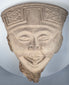 Pre-Columbian Mexican terracotta head with elaborate flaring headdress and geometric relief decoration