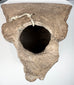 Ancient Veracruz smiling face ceramic sculpture with geometric headdress and pronounced modeled ears