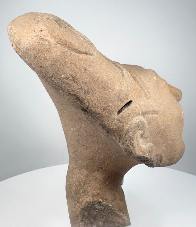 Ancient Veracruz ceramic head with expressive facial modeling and naturally aged buff terracotta surface