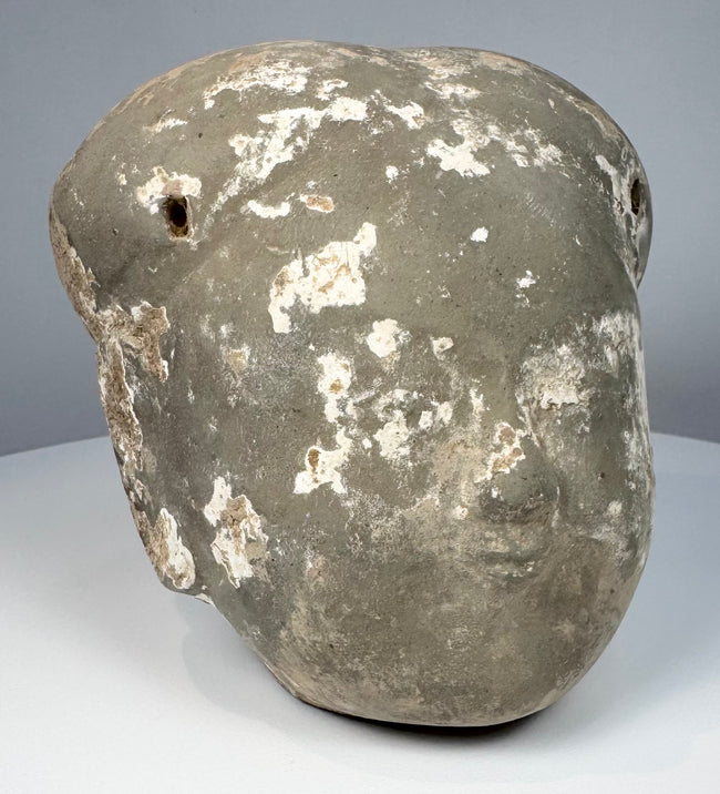 Ancient Chinese earthenware human head with pale slip remnants and mineral accretions