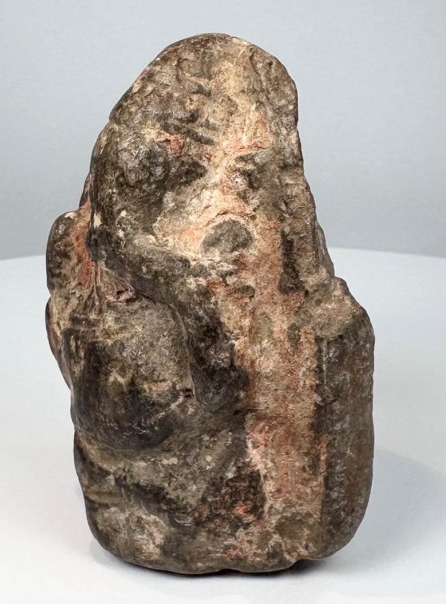 18th–19th century Ganesha votive carving with dark patina, mineral deposits and age-related wear
