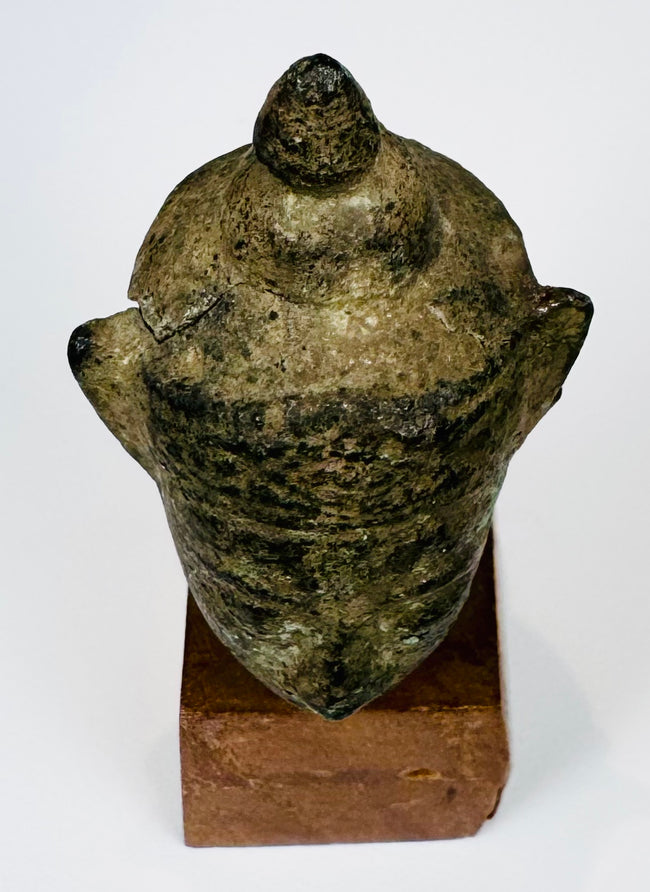 Thai Buddhist sculpture head fragment with natural verdigris, pitting and preserved facial details