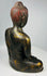 Chinese meditation Buddha sculpture with flowing robe folds and aged surface