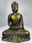 Antique Chinese seated Buddha sculpture showing devotional wear and patina