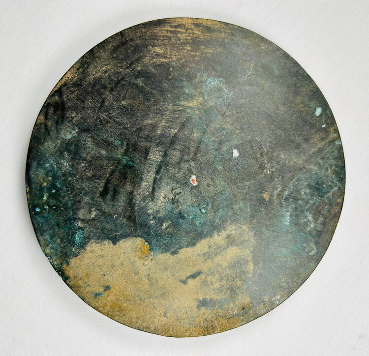 Tang Dynasty inspired bronze mirror artifact with aged archaeological surface