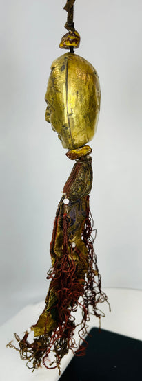 Qing Dynasty Tibetan gilt bronze guardian mask pendant