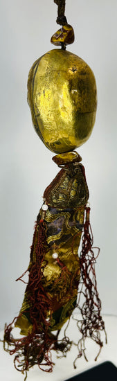 Antique Himalayan ritual hanging with bronze mask and silk elements
