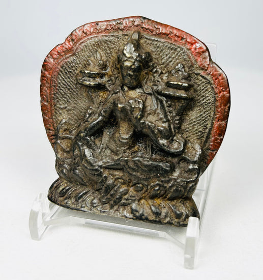Himalayan bronze shrine plaque with haloed deity figure
