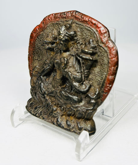 Tibetan cast bronze devotional pendant with seated Buddhist figure