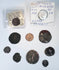Ten ancient and medieval coins displayed with the Septimius Severus and Ferdinando I identification holders.