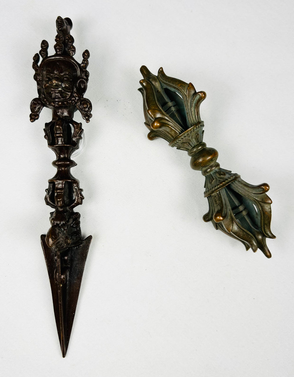 Antique Tibetan Buddhist phurba and double vajra ceremonial implements