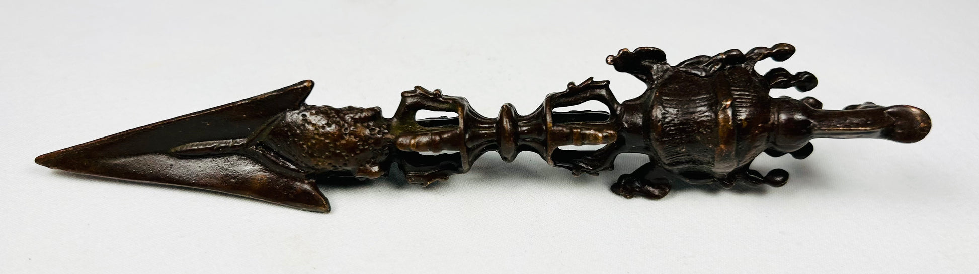 Tibetan Buddhist bronze ritual implements with natural patina