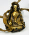 Himalayan Buddhist Gau shrine with cast devotional figure