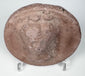 Ancient Greek mould-made terracotta roundel depicting an idealized female figure, circa 2nd–1st century BCE.