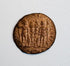 Late Roman bronze coin with worn architectural reverse, possibly a Constantinian camp-gate type, and naturally aged brown patina.