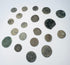 Twenty ancient Roman and Late Antique coins ranging from small bronze denominations to larger copper-alloy issues with historic corrosion and wear.