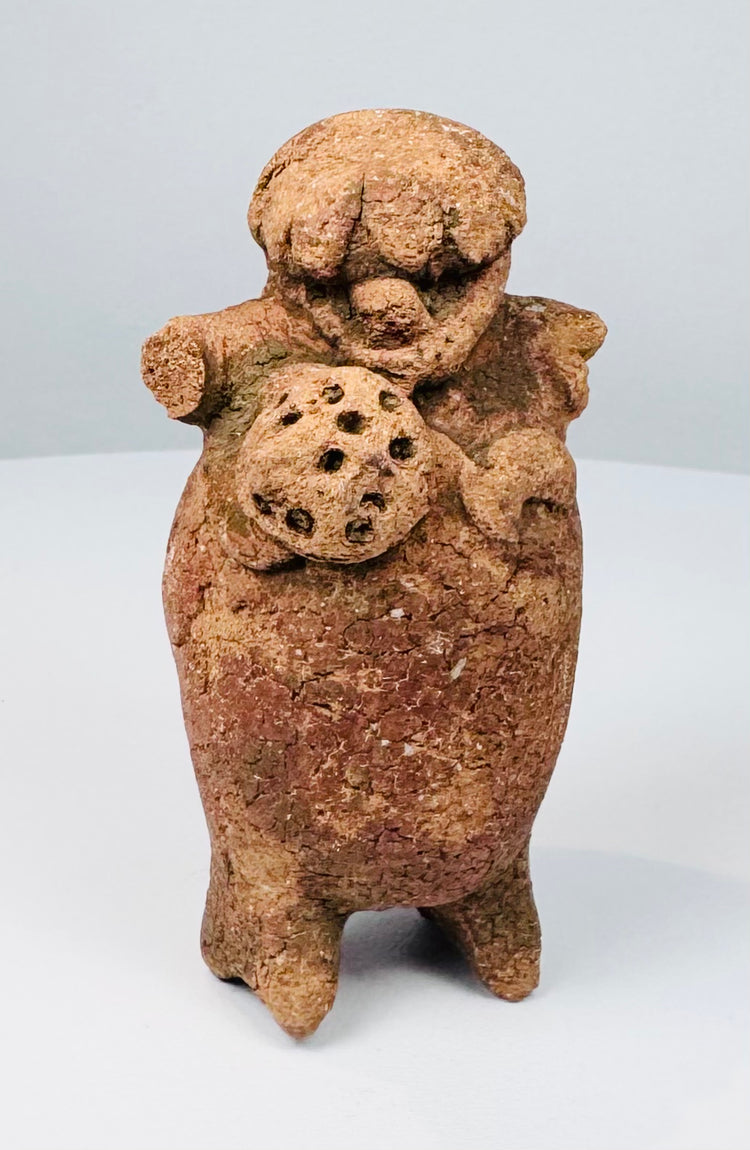 Late Classic Maya hollow terracotta standing figure rattle with reddish-brown archaeological patina