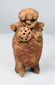 Late Classic Maya hollow terracotta standing figure rattle with reddish-brown archaeological patina