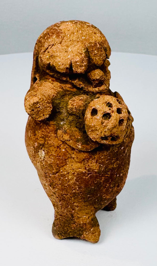Maya Late Classic ceramic rattle with short standing legs, applied arms, and mineral deposits