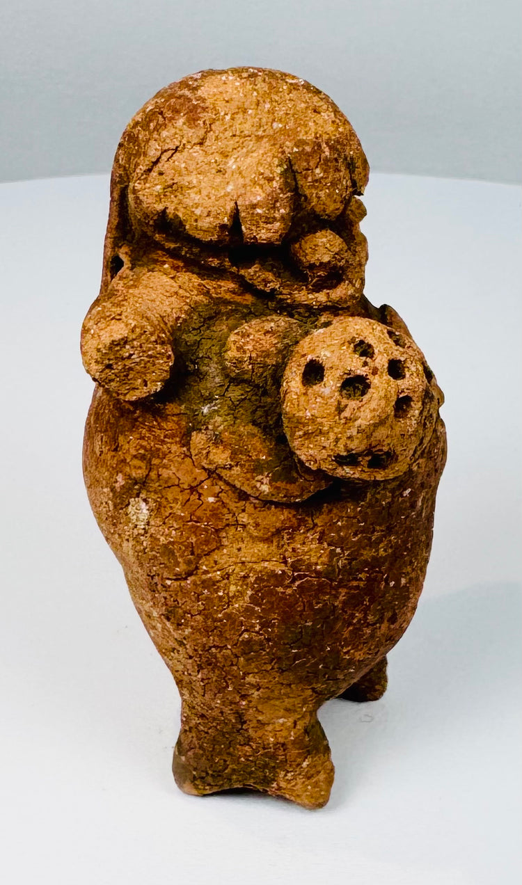 Maya Late Classic ceramic rattle with short standing legs, applied arms, and mineral deposits