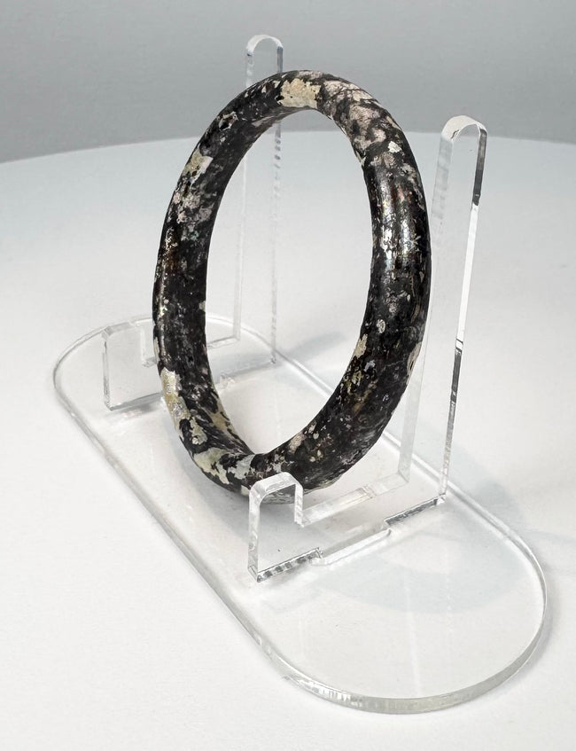 Roman glass bracelet with complete circular form and extensive cream, grey, and silver weathering