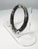 Roman glass bracelet with complete circular form and extensive cream, grey, and silver weathering