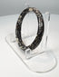 Roman glass bracelet with complete circular form and extensive cream, grey, and silver weathering