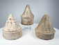 Buddhist clay stupas from Eastern India featuring conical spires, stepped tiers, and circular bases