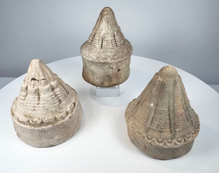 Ancient Buddhist miniature clay stupas with moulded ribs and decorative architectural bands