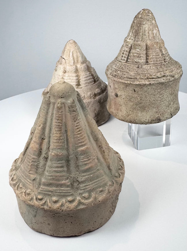 Three miniature terracotta stupas associated with the Buddhist traditions of Eastern India