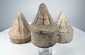 Ancient Indian votive stupas with moulded lotus-petal decoration and weathered archaeological surfaces