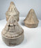 Early medieval Indian Buddhist votive stupas with natural wear, mineral accretions, and moulded decoration