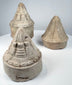 Early medieval Indian Buddhist votive stupas with natural wear, mineral accretions, and moulded decoration