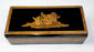 Top view of Anglo-Indian marquetry box showing reclining figural wood inlay and decorative borders