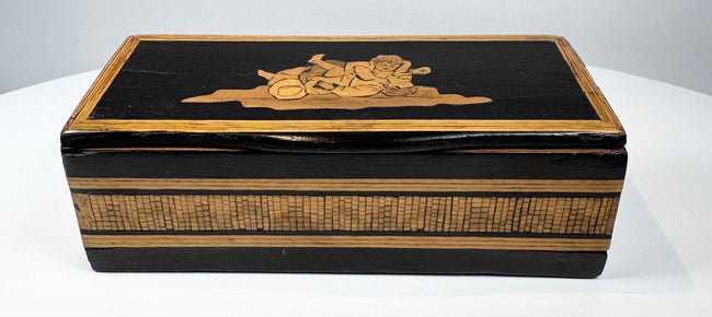 Anglo-Indian marquetry keepsake box showing black lacquered lid and patterned wood sides