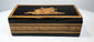 Anglo-Indian marquetry keepsake box showing black lacquered lid and patterned wood sides