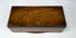 Underside of Anglo-Indian marquetry box showing natural wood base and antique construction