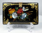 Victorian papier-mâché card case featuring iridescent mother-of-pearl flowers against black lacquer
