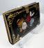 Victorian mother-of-pearl calling card case showing richly decorated lacquered surface and gilt detailing