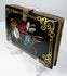 Antique papier-mâché card case with polychrome flowers, shell inlay, and ornate gold scroll decoration