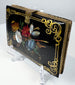 Antique papier-mâché card case with polychrome flowers, shell inlay, and ornate gold scroll decoration