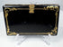 Victorian lacquered calling card case displaying mother-of-pearl floral ornament and decorative edge detailing