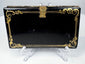 Victorian lacquered calling card case displaying mother-of-pearl floral ornament and decorative edge detailing