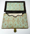 Open Victorian calling card case showing original-style patterned paper lining and shaped interior card pocket